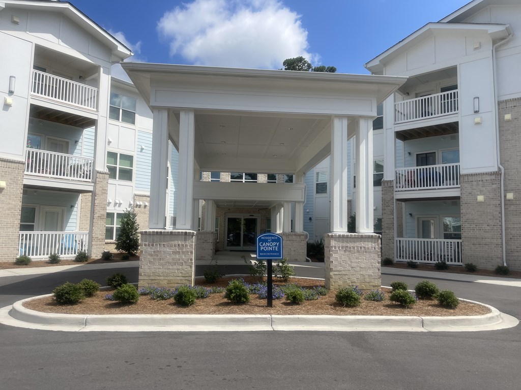 The entrance to a building with a sign that says "Community".