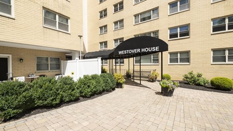 A building with a sign that says Westover House.