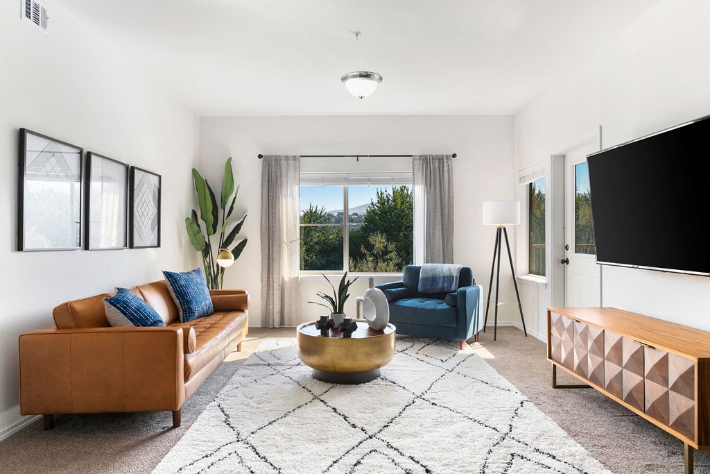 Living Room With TV at Mosaic on the River Apartments, Richland, Washington