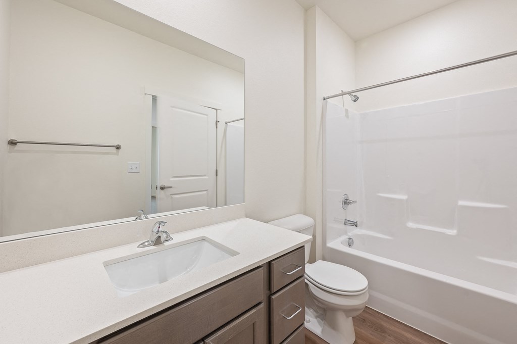 a bathroom with a sink and a shower and a toilet at Gateway Apartments, East Wenatchee , Washington