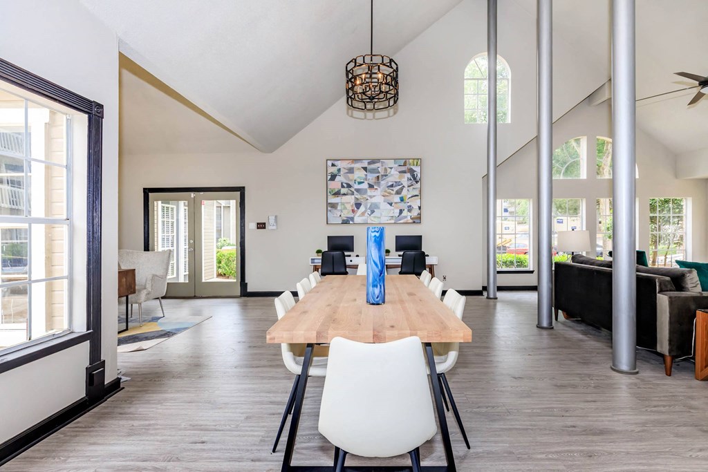 the dining room is open to the living room and kitchen at The Davis Apartments, Alabama  