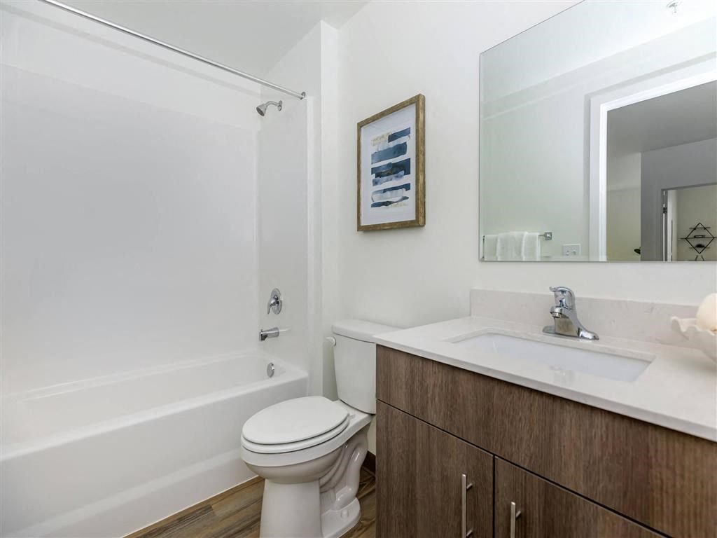 a bathroom with a sink toilet and bathtub at Jefferson Yards, Tacoma