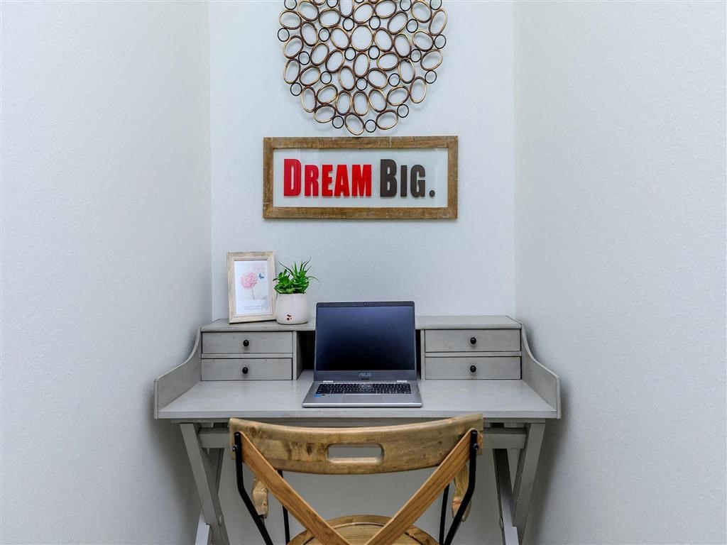 a desk with a laptop and a chair in a room at Jefferson Yards, Tacoma, WA 98402