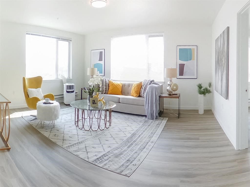a living room with a couch and a table at Jefferson Yards, Washington, 98402