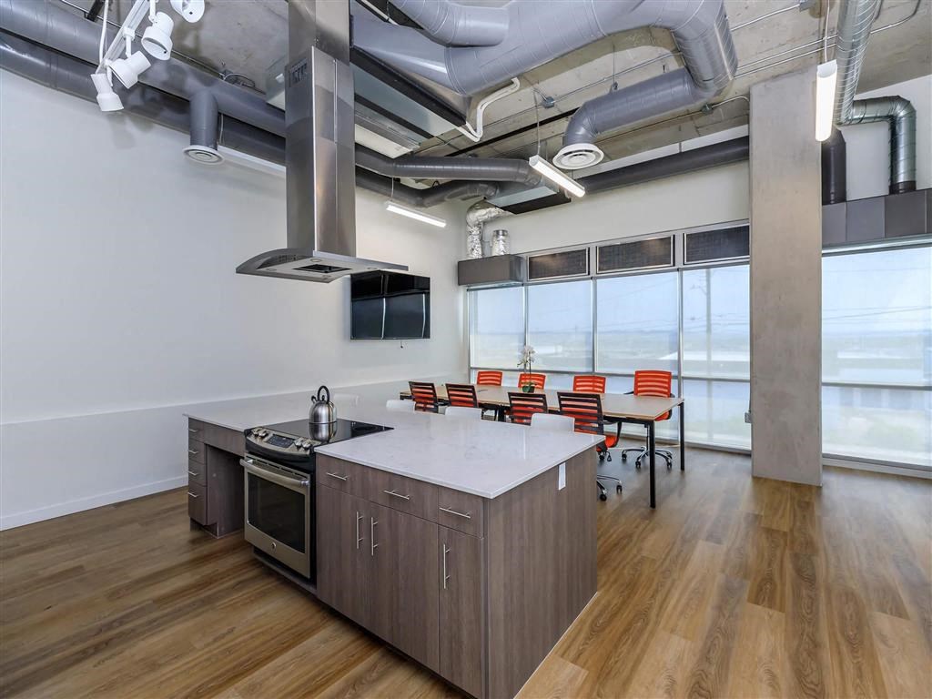 a kitchen and dining area in an office at Jefferson Yards, Tacoma