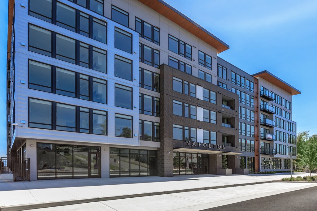 a large building with many windows and a sign that says napoleon at Napoleon Apartments, Tacoma, WA 98402