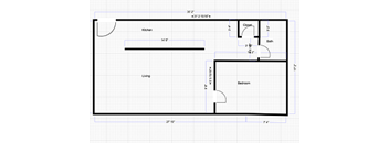 A floor plan of a house with a kitchen, living room, and bedroom.