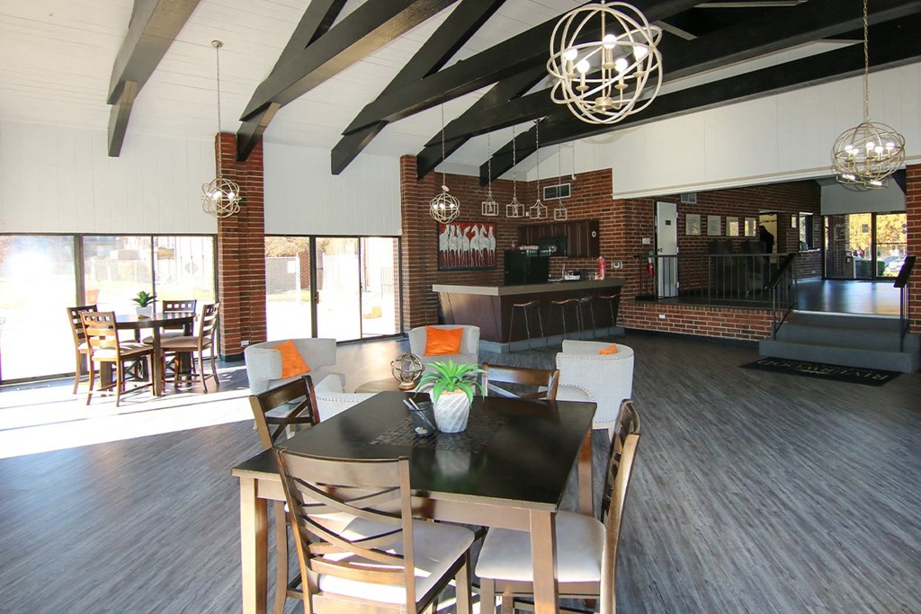clubhouse room with chairs and a table at Lansing Riverwood, LLC, Lansing, 60438