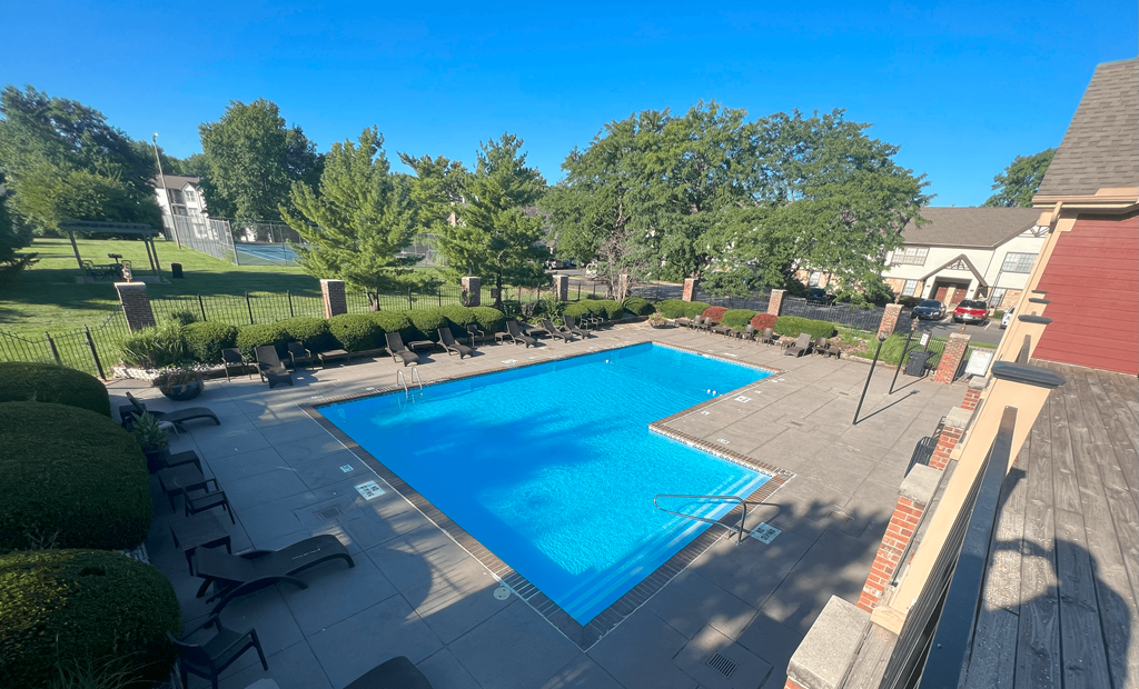 a view of the pool from the roof of a house
