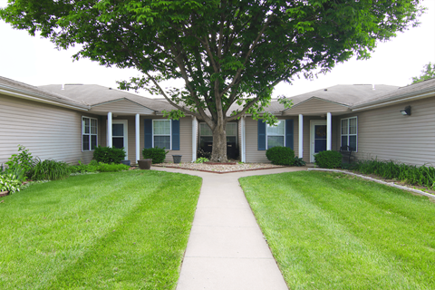 Grassy area at Cottages of Topeka, Topeka, 66608