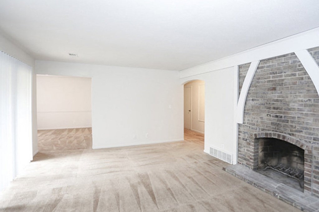 Living Room with fireplace look around at Canyon Creek Apartments, Missouri, 64132