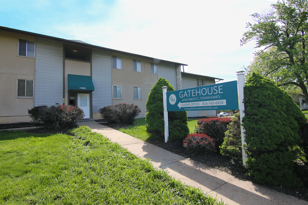 a building with a gate house sign in front of it at Gatehouse Apartments, Kansas City, MO, 64134