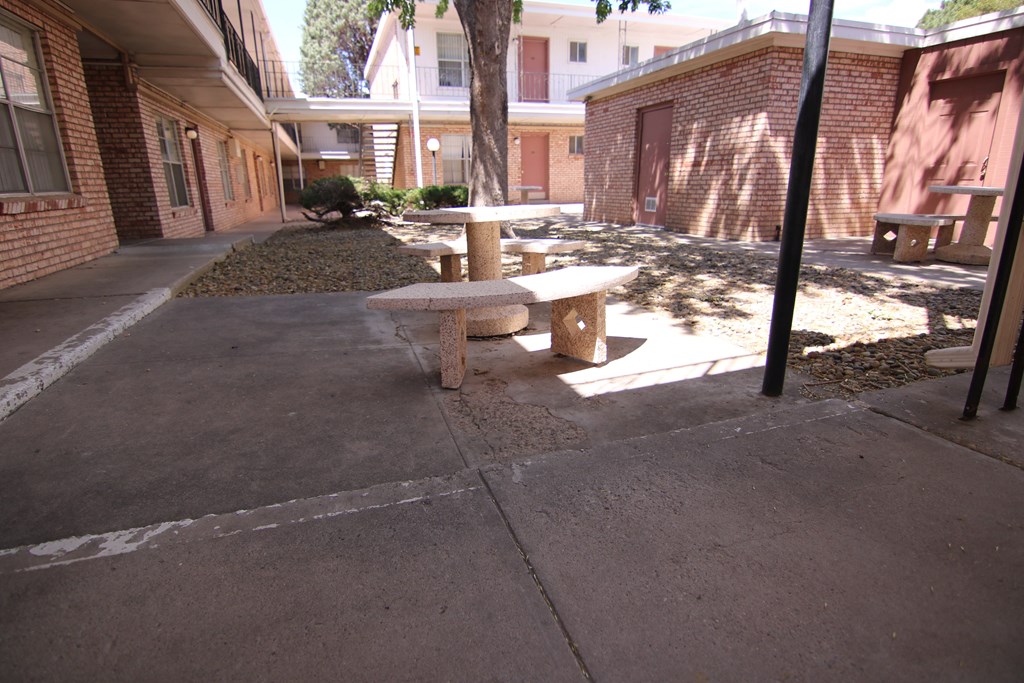 a picnic table in the courtyard