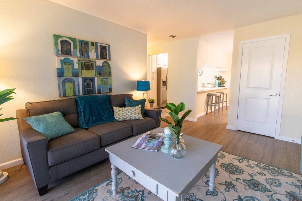 a living room with a couch and a coffee table