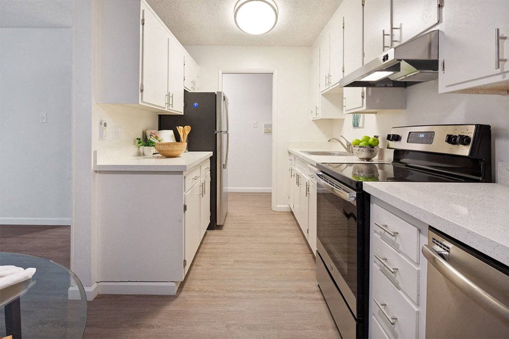 White Cabinetry And Appliances In Kitchen at Marine View Apartments, California, 94501