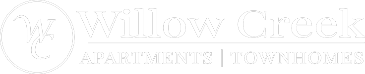 A logo for Willow Creek apartments and townhomes.
