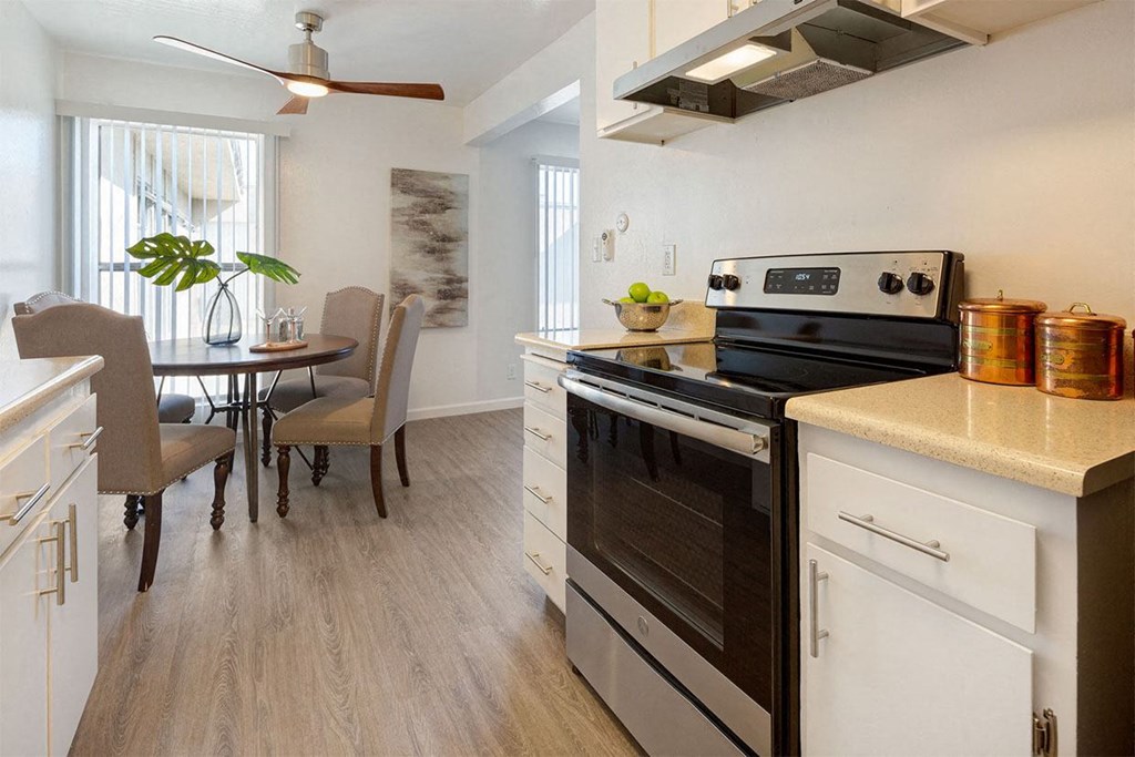 Fitted Kitchen With Island Dining at Three Crown Apartments, Alameda, California