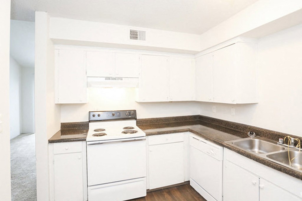 Wood floor kitchen at Canyon Creek Apartments, Missouri, 64132