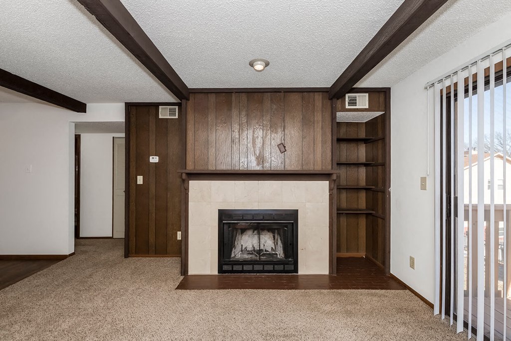 West One Bedroom Living Room and Fireplace at Raintree Apartments, Topeka, KS, 66614