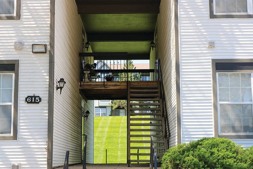 Peaking through the breezeway at Coach House Apartments, Kansas City, MO