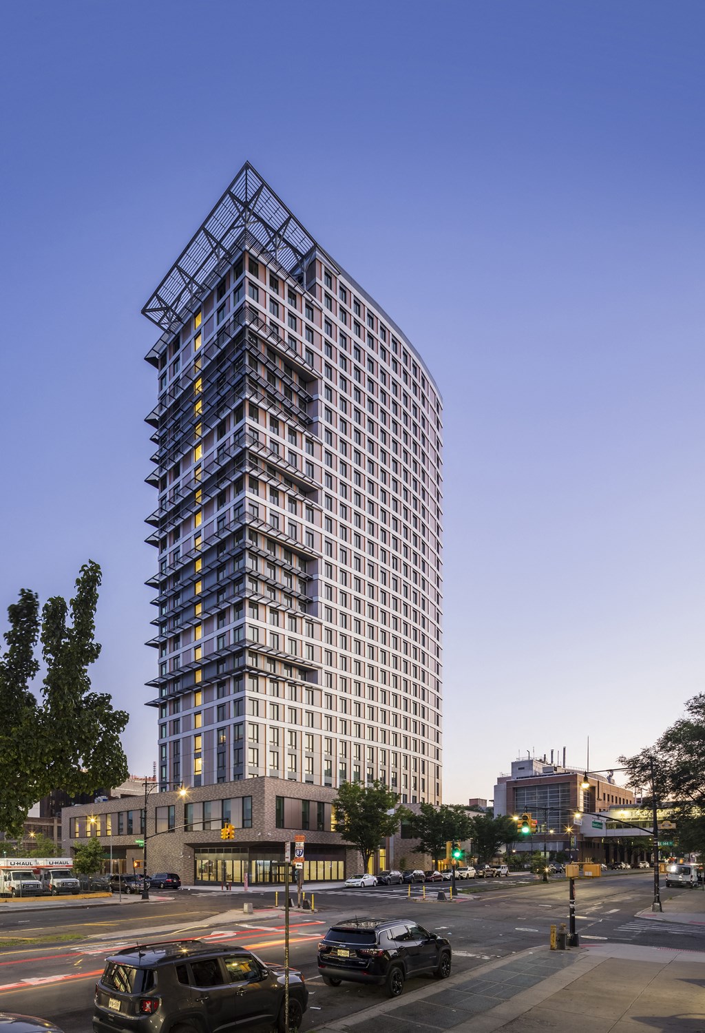 a rendering of a tall skyscraper in a city