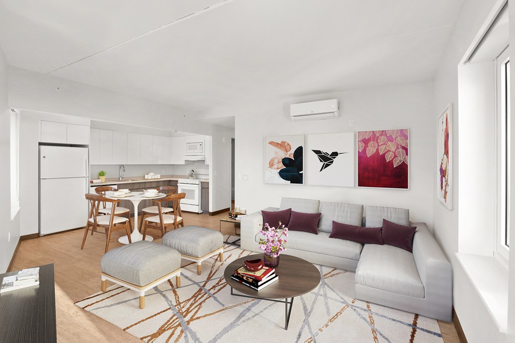 a living room with a couch and a table