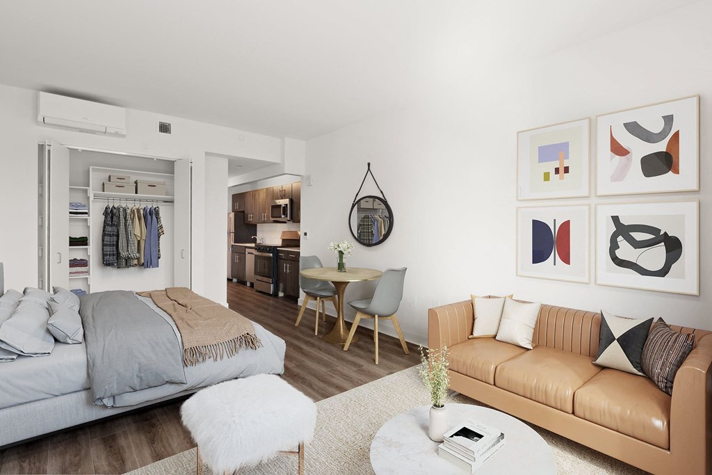 a living room with a bed and a couch