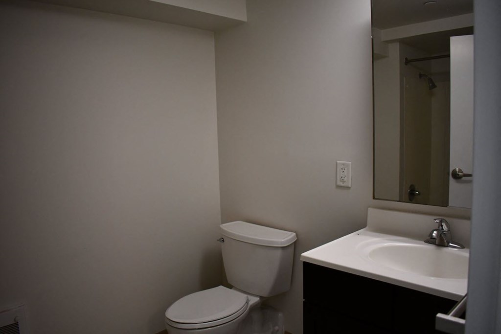 a small bathroom with a toilet and a sink