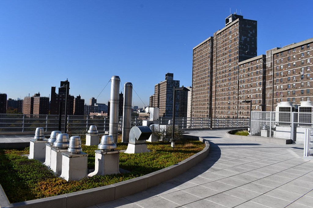 a view of the city from the roof of a building