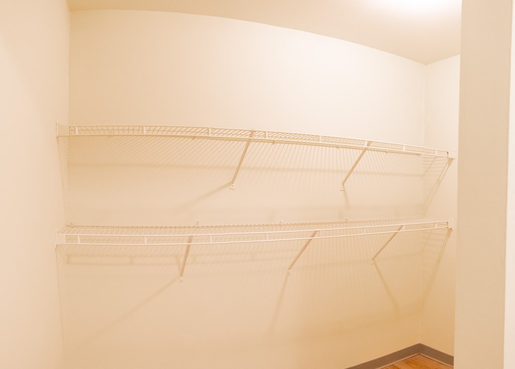 a walk in closet at the historic electric building in fort worth, tx