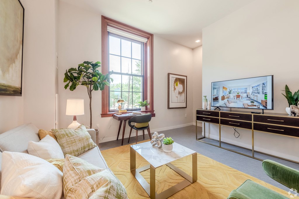 a living room with a couch and a coffee table