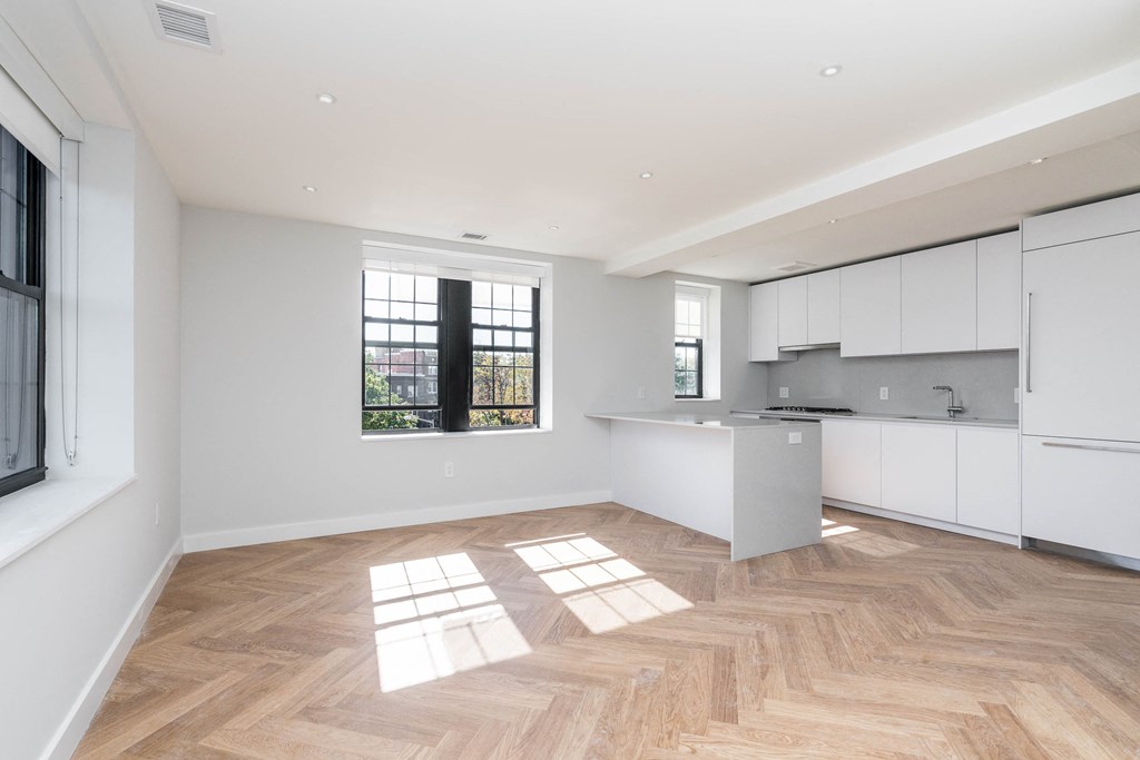 The Stanton luxury apartment with herringbone hardwood, Bosch appliances and quartz countertops