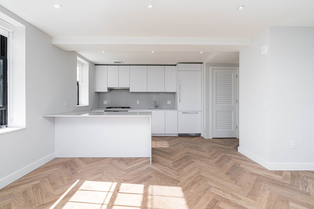 The Stanton luxury unit with hardwood floors and quartz countertops