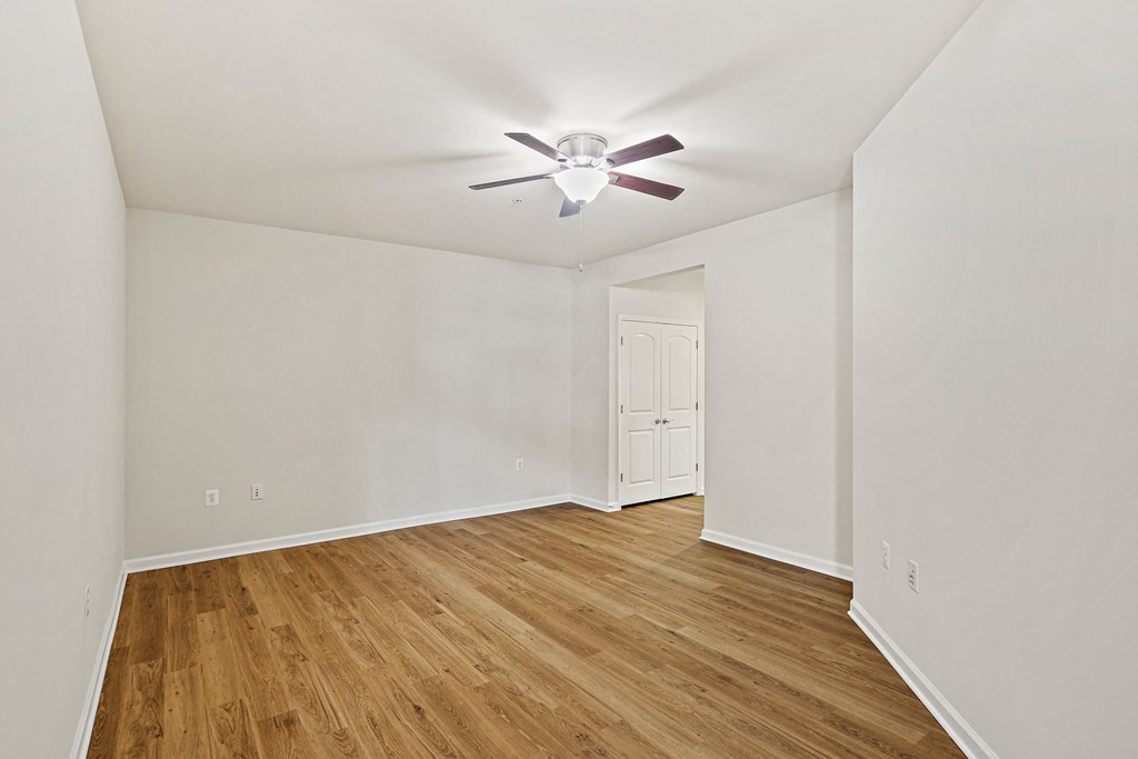 bedroom with wood floors