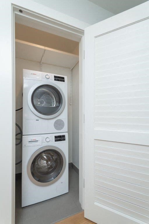 a washing machine and a dryer in a closet
