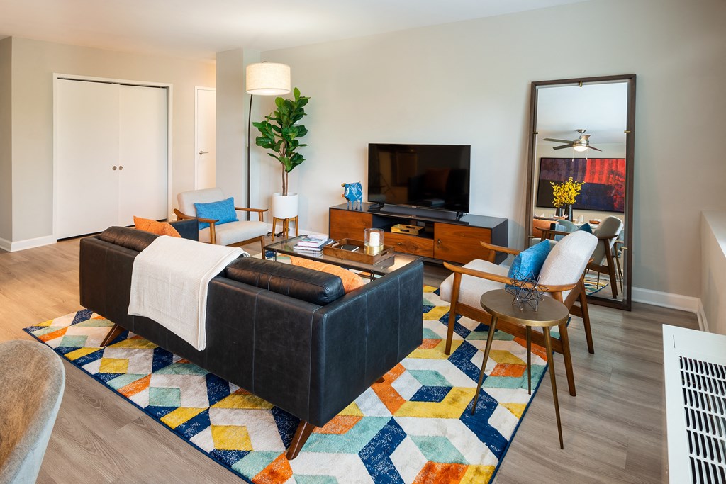 a living room with a couch and a tv