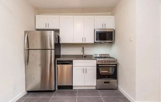 White Kitchen with updated stainless steal appliances