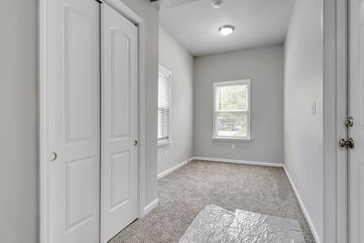 Photo of dining room with new carpet and large closet