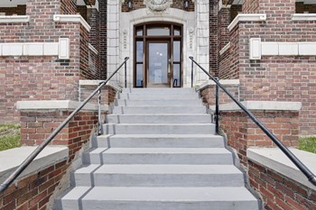 Exterior image of stairs leading up to building - Photo Gallery 3