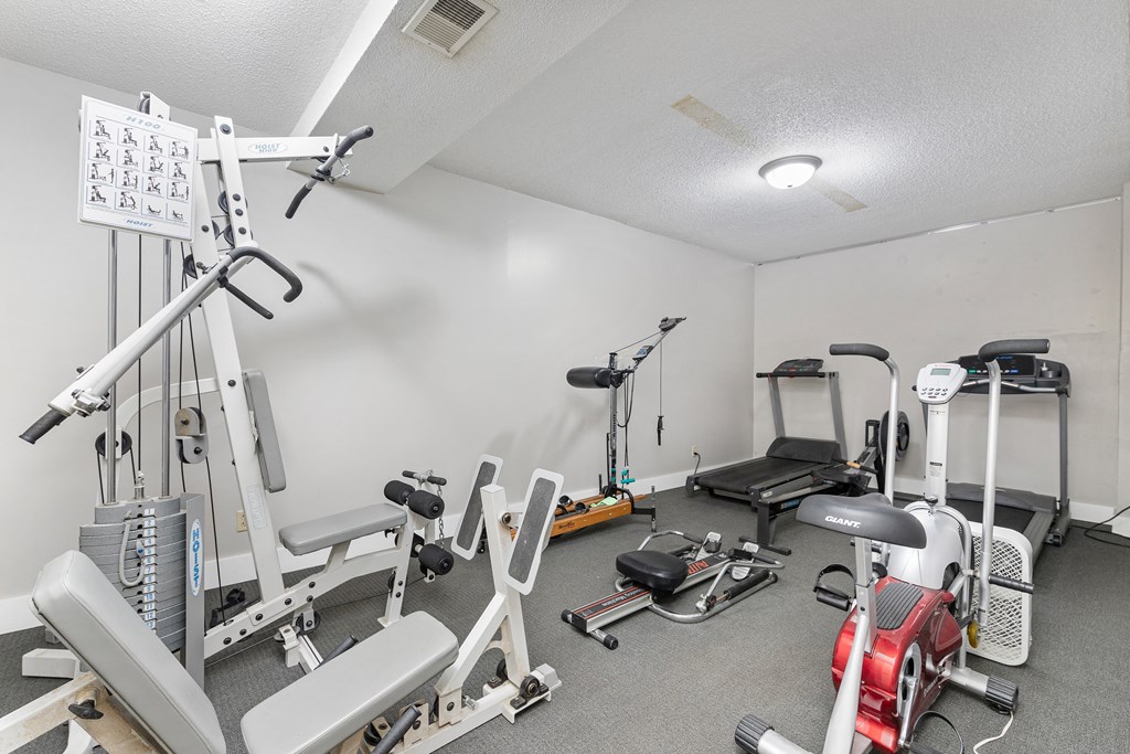Photo of gym with cardio and strength training options in Fairway, Kansas.