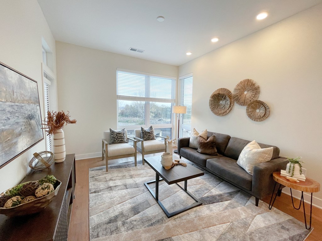 a living room with a couch and a coffee table