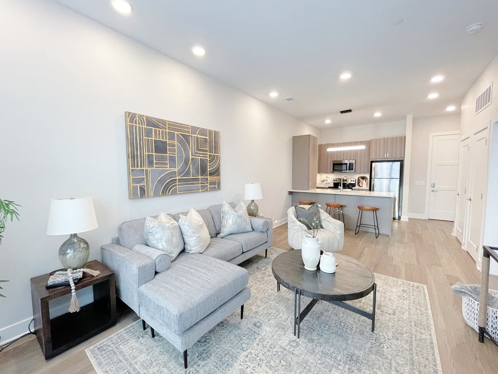 a living room with a couch and a table