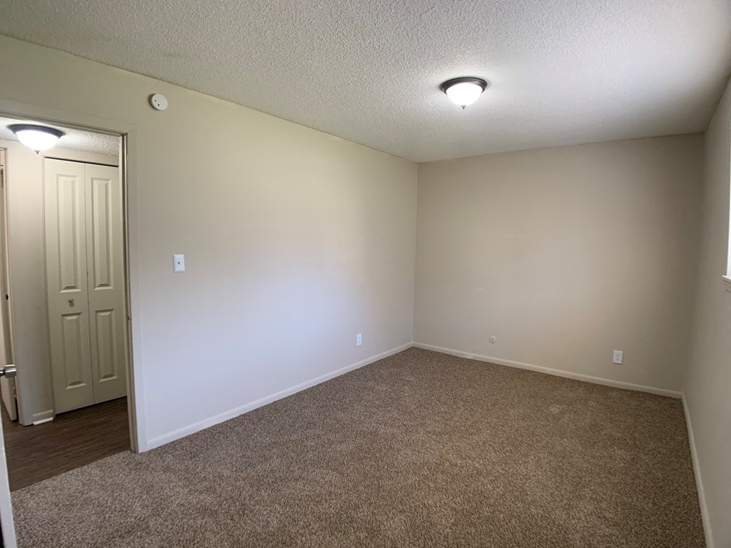Image of a carpeted bedroom