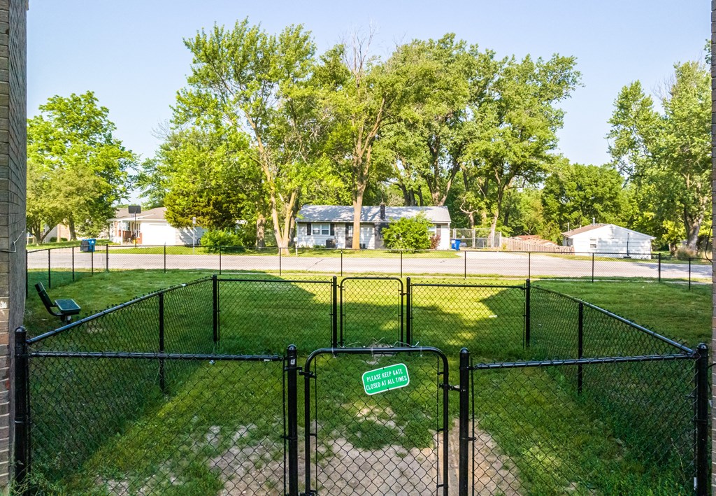 our apartments showcase a dog park with plenty of room to run