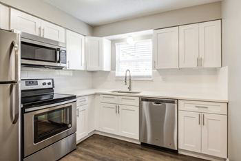 Kitchen with cabinets and stainless steel appliances