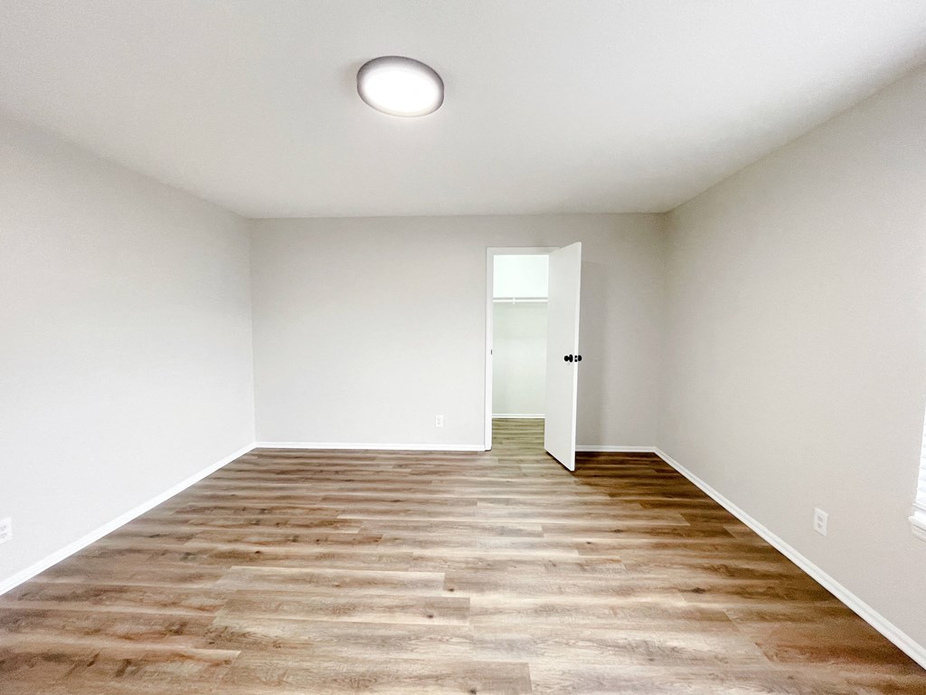 open room with vinyl flooring
