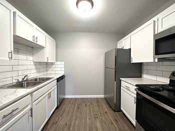 Updated with stainless steel appliances at the 1 twenty two at 63rd apartments - Photo Gallery 2