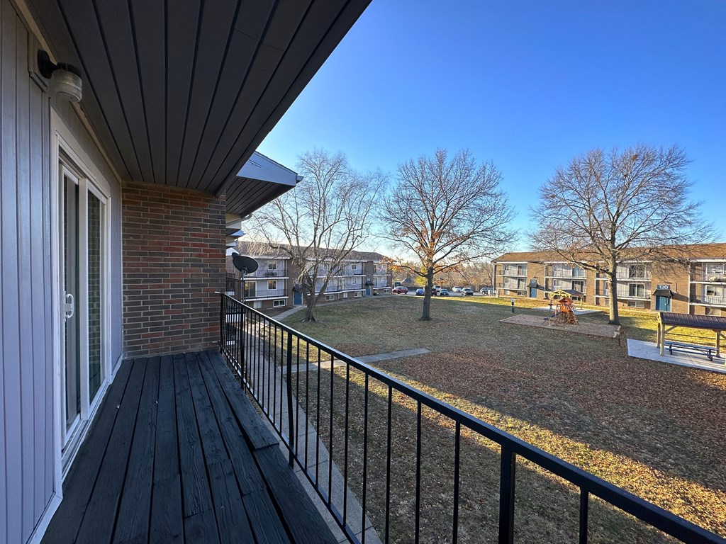 Open patio from the living room  the 1 twenty two at 63rd apartments