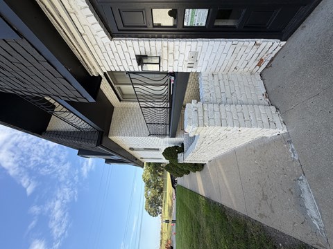 A view from below looking up at a building's exterior.
