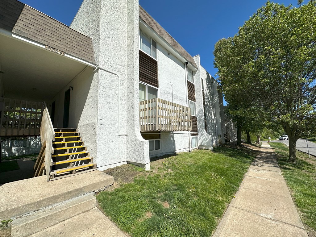 a view of the back of the building from the sidewalk